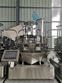 The working principle of Multi head weigher