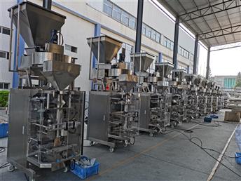 Fast and stable running vertical packaging machine with measuring cup for packing prawn slices and prawn chips.